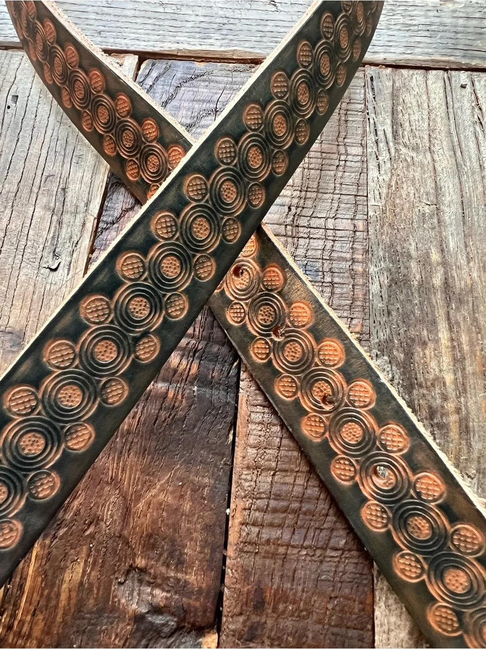 Two toned stamped leather belt with silver buckle